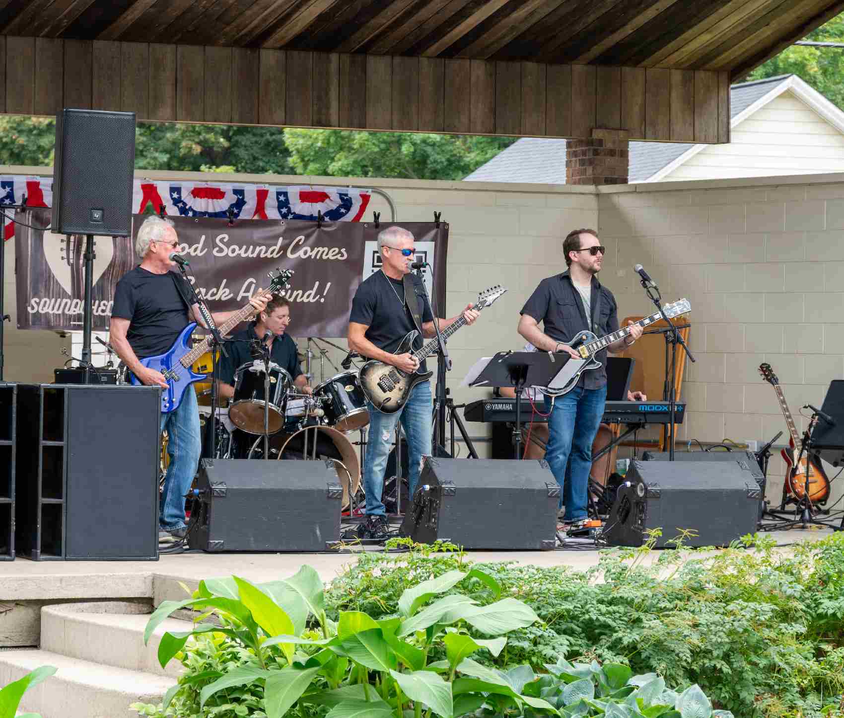 men performing in a band